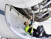 mechanic fixing engine