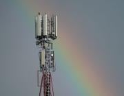 5G tower and rainbow