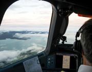 operator assists pilot