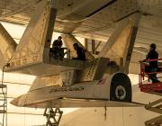 technicians attach Talon-A to the Roc