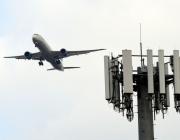 plane and 5G tower