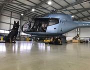 The NGOs Animals Saving Animals and Explorers Against Extinction have trained anti-poaching dogs at SaxonAir’s hangar, familiarizing the dogs with helicopters before they are sent on live missions.