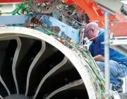 aircraft technician working on nacelle