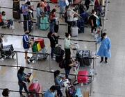 travelers waiting for COVID testing