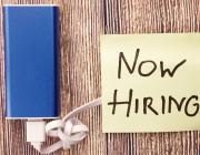 USB battery charger with Now Hiring note