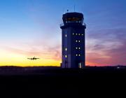 ATC tower and plane landing