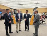Padhraic Kelleher (center left) at the Singapore ATC center, with CAAS DG Han Kok Juan (center right).