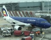 air moldova jet on tarmac with ground handling equipment