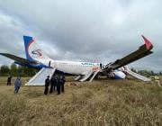 Ural airlines landing in wheat field