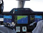 business aviation pilots in Phenom 100E cockpit