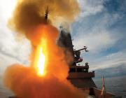 Royal Navy ship firing missile