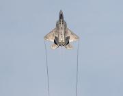 U.S. Air Force F-22 Raptor takes off, viewed from below