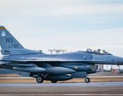 F-16 fighter landing on runway