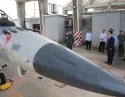 Group gathered around Advanced Defense Fighter