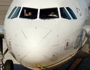 Aircraft with pilots in cockpit
