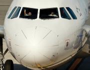 Aircraft with pilots in cockpit