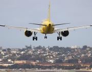 Spirit Airlines aircraft taking off, viewed from rear