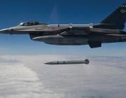 Aircraft deploying Stand-in Attack Weapon over clouds