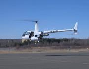 Unither Bioelectronics  Caption: The modified R44 has a hydrogen tank under the tailboom and two cooling nacelles either side of the cabin