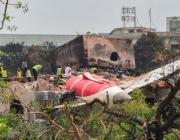 an investigation team at the Air India crash site