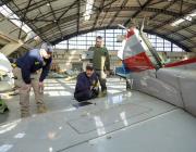 NTSB investigators look at wreckage.