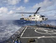 SH-60K landing on Arleigh Burke-class guided-missile