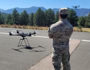 A Defense Innovation Unit soldier tests drones.