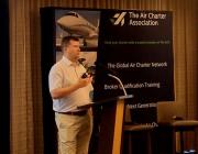 Glenn Hogben, CEO of The Air Charter Association, speaks at the association’s first U.S. conference. 