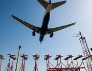 airplane landing over lights at Heathrow