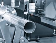 Cutting of metal in an aerospace production facility with sparks flying from laser