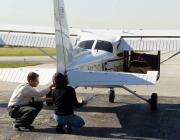 two people and a business jet