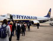 passengers boarding ryanair jet