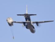 paratroopers jumping out of aircraft