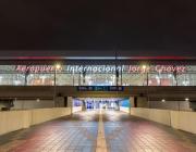 LIM airport sign at night