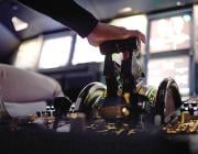 pilot's hand on flight deck controls