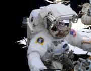 NASA astronaut and Expedition 72 Flight Engineer Nichole Ayers is pictured during a spacewalk to upgrade the orbital outpost’s power generation system and relocate a communications antenna.