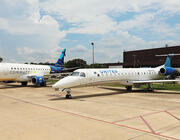 One CommuteAir and one United Express Embraer jet