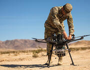 U.S. Army soldier handling drone