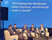 Corporate Jet Investor London panelist on stage