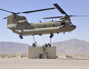 Soldiers attached a Conex box to a CH-47 Chinook. 
