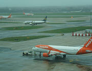 EasyJet aircraft on tarmac with Ryanair and Easyjet aircraft in background