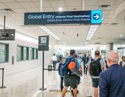 Global entry sign with travelers at Hartsfield-Jackson Atlanta Airport