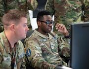 Guardians and Airmen of the 4th Electromagnetic Warfare Squadron, Mission Delta 3, participate in Space Flag 26-1 at Peterson Space Force Base, Colorado, Dec. 12, 2025. The service members, part of U.S. Space Force Combat Forces Command, trained to defeat realistic threats and maintain space superiority in a contested environment. (U.S. Space Force photo by Dave Grim)