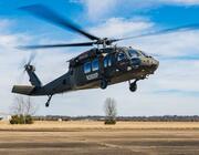 – Near Earth Autonomy  Caption – Near Earth Autonomy is flying an ex-U.S. Army Sikorsky UH-60L Black Hawk converted into an RUC-60 uncrewed logistics platform