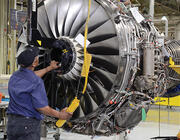 mechanic working on engine