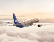 SAS aircraft inflight above the clouds