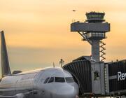 Lufthansa aircraft at Berlin Airport at sunset