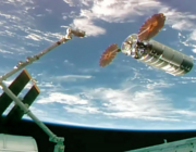 The Cygnus XL cargo spacecraft arrives at its capture point 12 meters away from the International Space Station before the Canadarm2 robotic arm, operated by NASA astronaut Chris Williams, reaches out and grapples the resupply ship.
