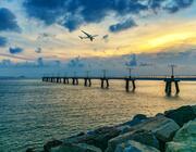 An airplane landing at the Hong Kong airport 