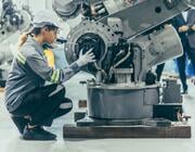 Engineer working with a robot